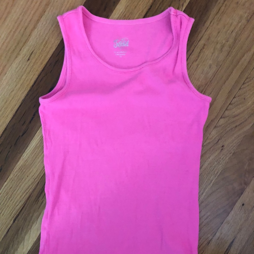 Three justice tank tops